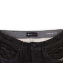 GRAY WORN BLACK COATED SKINNY JEANS