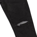 GRAY WORN BLACK COATED SKINNY JEANS