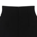 BLACK SHORT SKIRT WITH TWO BUTTON PLACKETS