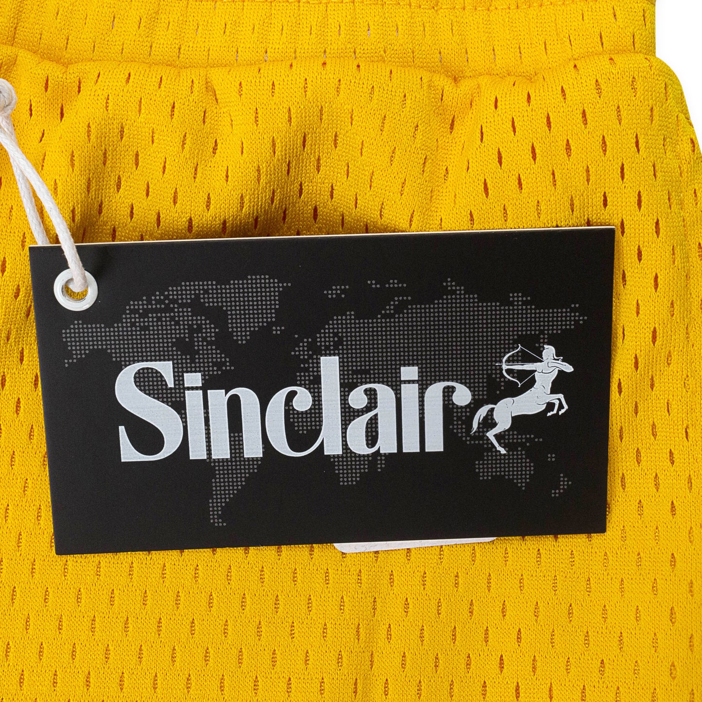 SCRIPT LOGO MESH YELLOW SHORTS