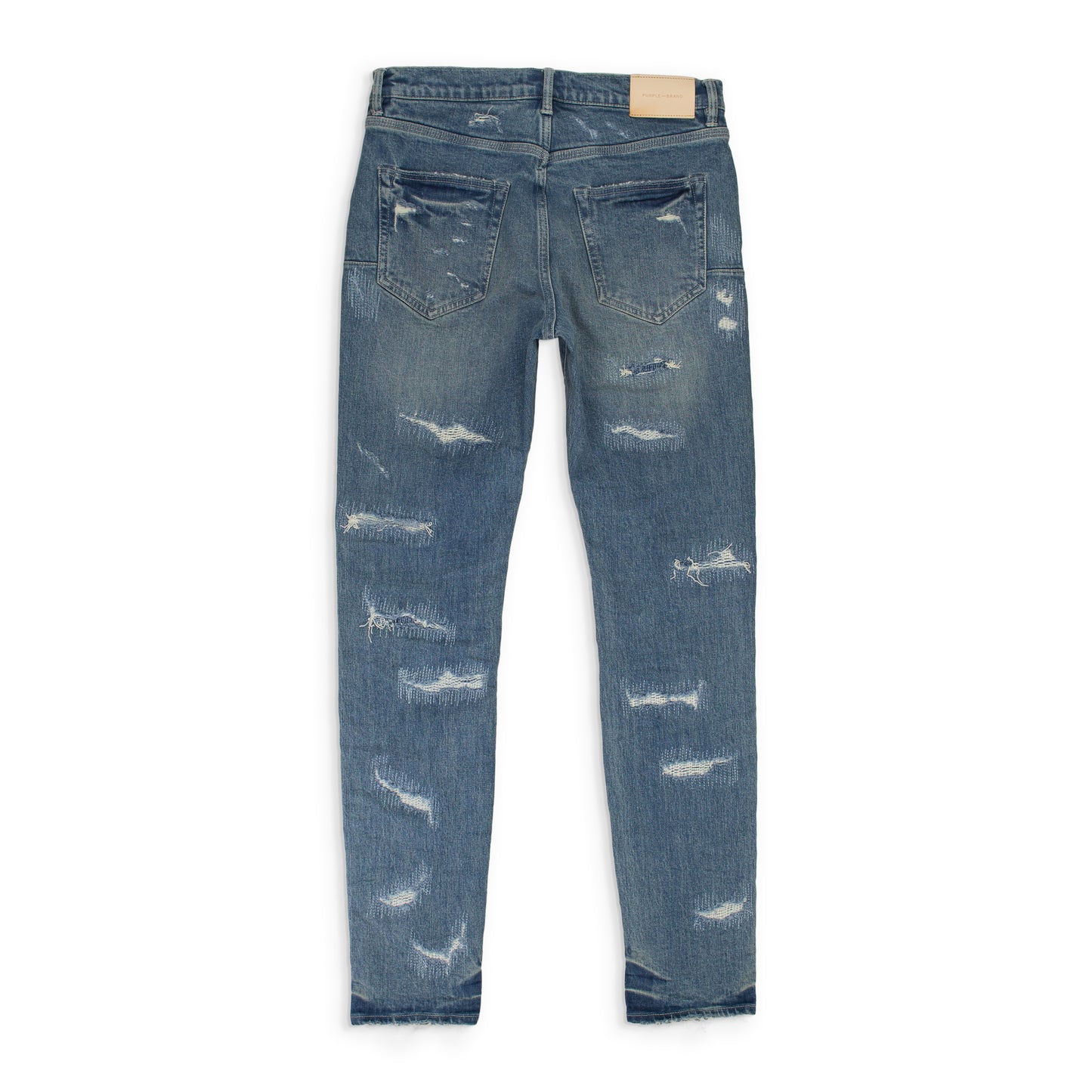 HEAVY DISTRESS REPAIRS Indigo SKINNY JEANS