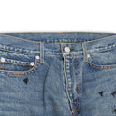 DENIM PANTS WITH EMBROIDERY DETAIL