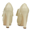 LEATHER FLAP FRONT WITH BOW WHITE PUMPS & HEELS