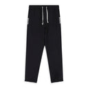 BLACK OUT OF NOTHING TRACK PANTS