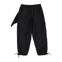 BLACK TECH NYLON WITH ANKLE GATHERING AND PRESSED ROSE TRACK TROUSERS