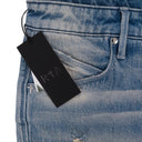 BLUE LIGHT WASH DISTRESSED SKINNY JEANS