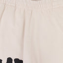 TAN TRASHER SWEATPANTS