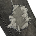 GREY DIRTY RESIN BLOWOUT SKINNY JEANS