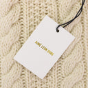 CREAM ARAN CABLE MOCKNECK SWEATER