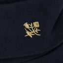 NAVY CREST TURTLENECK SWEATER