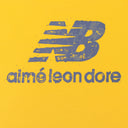 YELLOW NEW BALANCE GARMENT DYED T-SHIRT