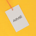 YELLOW NEW BALANCE GARMENT DYED T-SHIRT