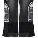 BLACK PATCHED ARCH STRAIGHT-FIT JEANS