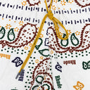 CREAM LOGO SWIM TRUNKS