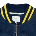 NAVY OVERSIZED LOGO TERRY VARSITY JACKET