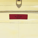YELLOW ROCKSTUD TRAPEZE MEDIUM TOTE BAG